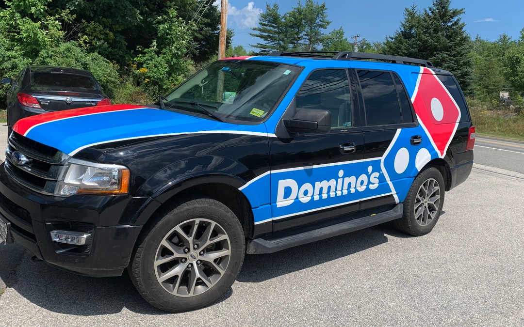 Domino's delivery partial vehicle wrap